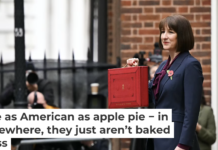 The obligatory showing of the red briefcase containing budget details is as exciting as it gets in the U.K. Justin Tallis - WPA Pool/Getty Images